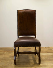 Load image into Gallery viewer, The Rawlins Chair – Cowhide Leather Dining Chair with Nailhead Trim