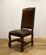 Load image into Gallery viewer, The Rawlins Chair – Cowhide Leather Dining Chair with Nailhead Trim